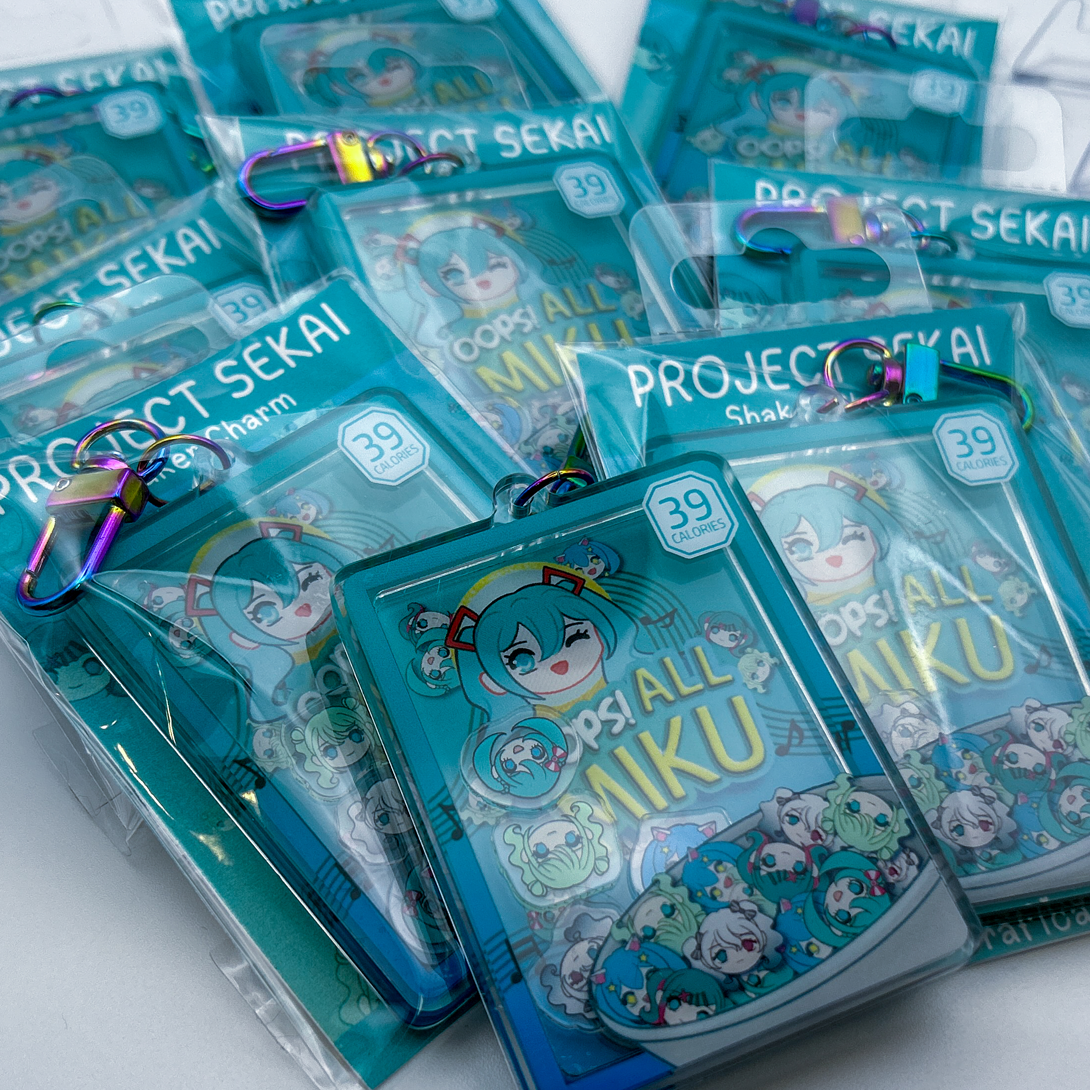Oops! All Miku Shaker - A shaker charm depicting the different Hatsune Miku's from Project Sekai, in an Oops! All Berries-themed cereal box. Each Miku is a shaker piece inside the charm.